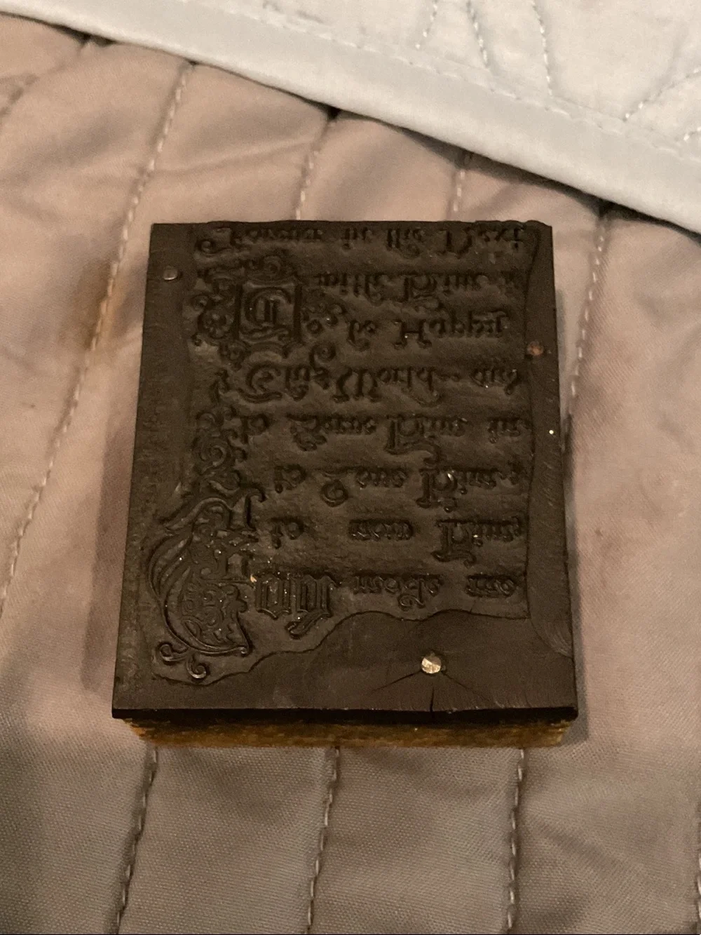 Vintage letterpress printing block.